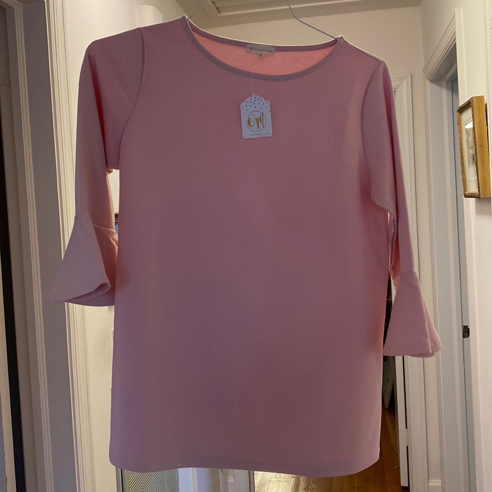 Women’s pink 3/4 bell sleeve top.